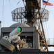 Illustration for article titled Watch The Navy's First Operational Laser Cannon Blow Crap Up
